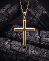 Facet Cross minimal solid yellow gold cross pendant on chain, front view